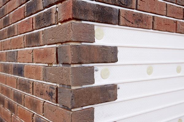 Insulated brick cladding