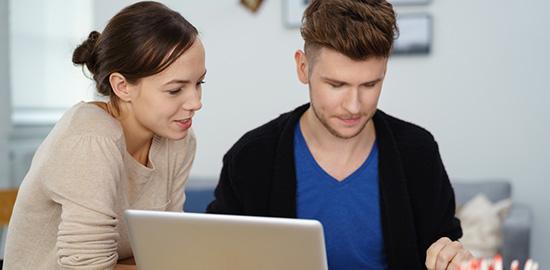 Couple at laptop